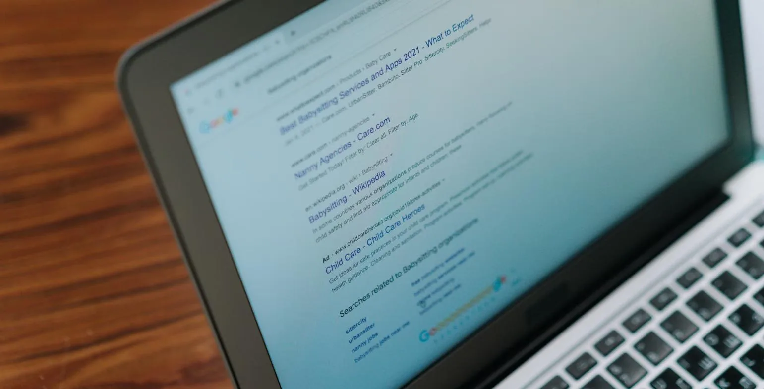 Laptop screen showing a page of Google search results