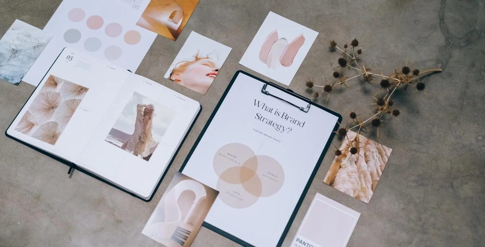 Brand strategy moodboard with colour swatches and a printed brand diagram