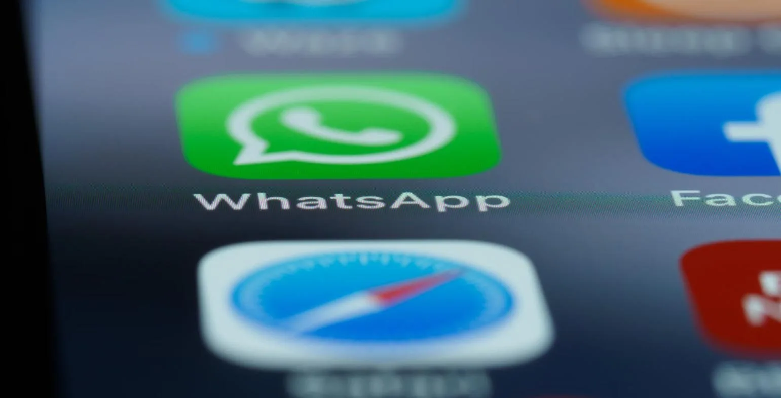 Close-up of the WhatsApp app icon on a smartphone home screen